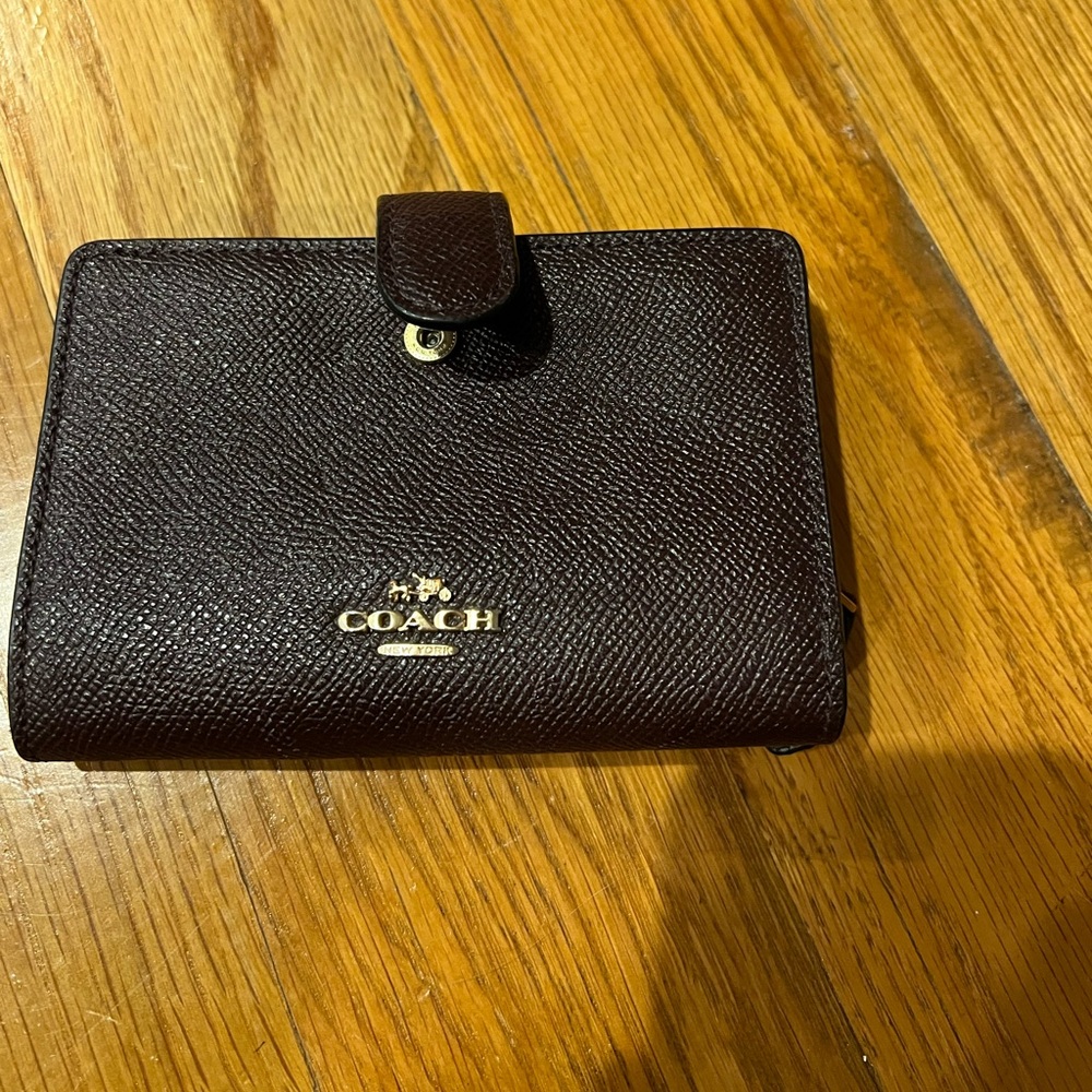 Used - Good condition - Maroon Coach Wallet